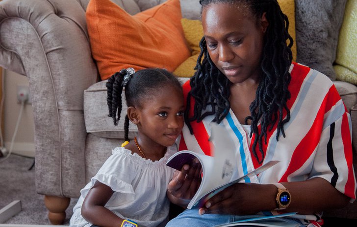 Mother and daughter reading