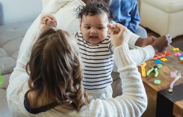 baby and mum playing