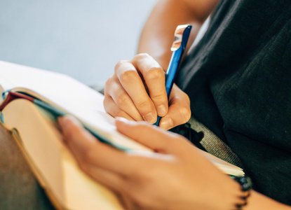 Writing in book